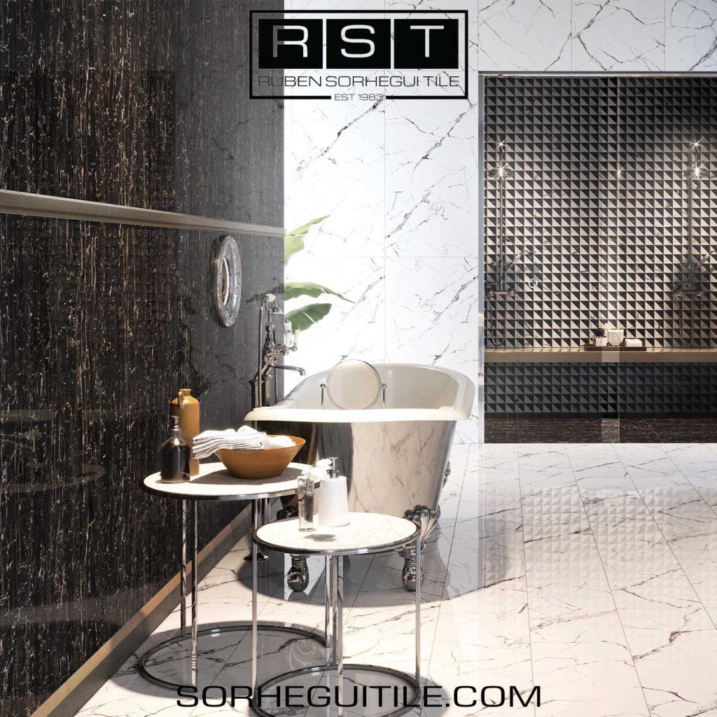 A bathroom with elegant black and white tiles.